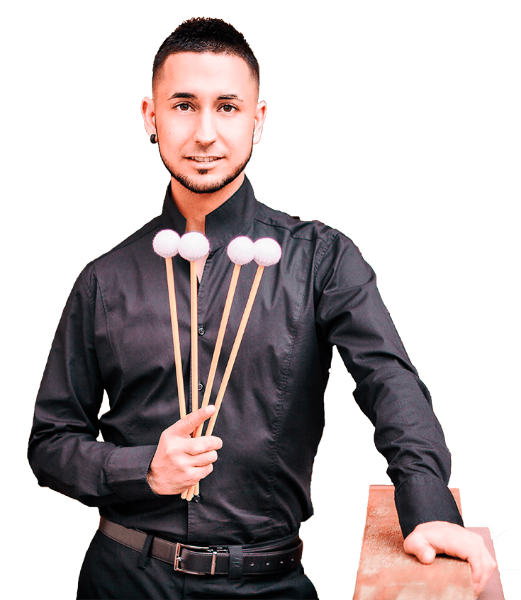 Picture of Conrado Moya with mallets in his hands